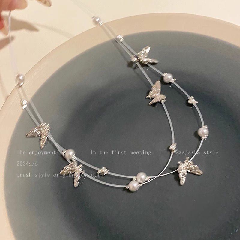 New double-layer butterfly pearl necklace for women with a light luxury and niche design collarbone chain 2024 new style details Picture