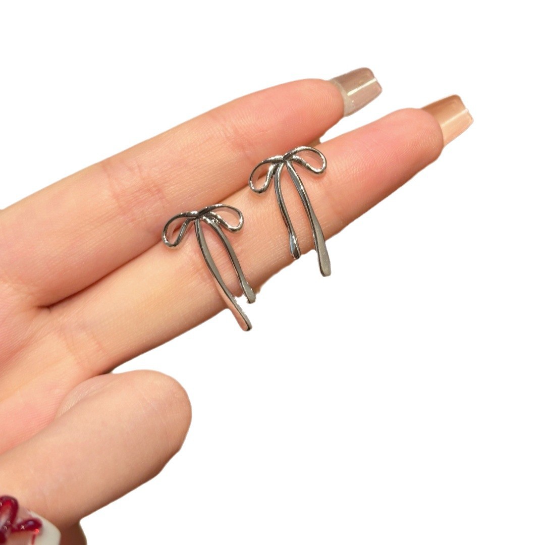 Cold bow ribbon earrings for women, simple, exquisite and cold style. Silver stud earrings, fashionable and versatile, elegant earrings Item Picture