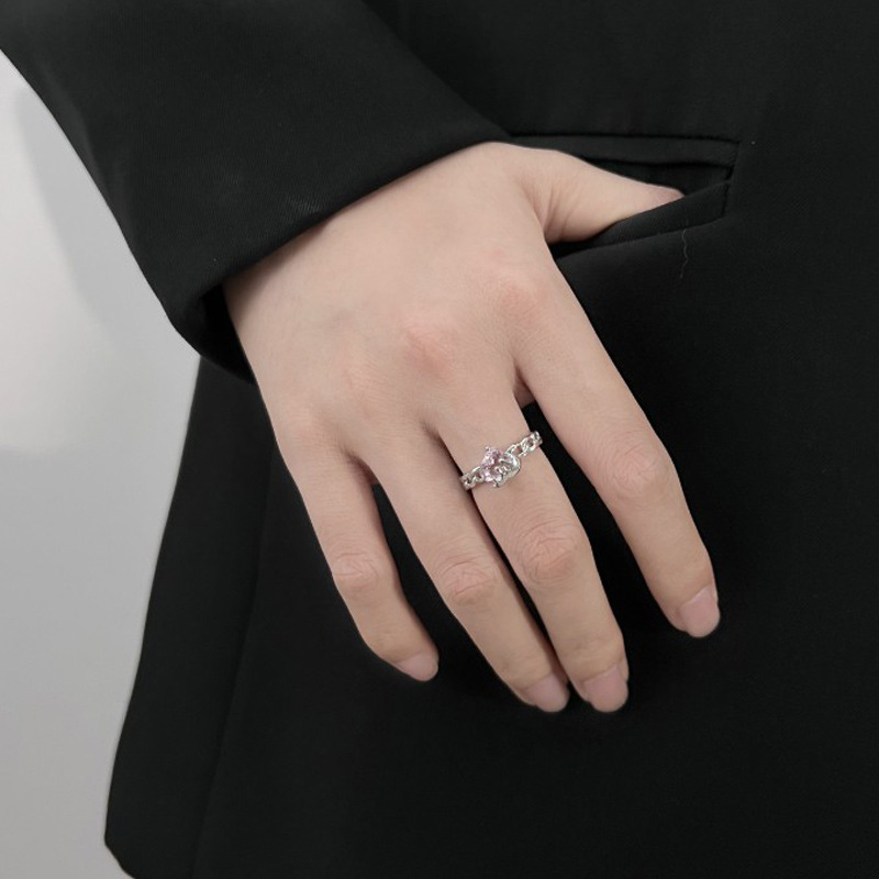 The liquid pink heart-shaped ring for girls features a sweet and cool, niche design. It's a Korean-style ring with an adjustable opening for the index finger details Picture