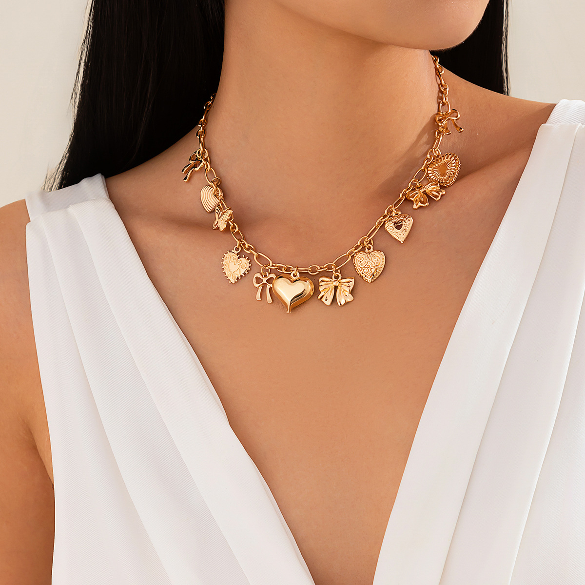 European and American cross-border jewelry punk style heart alloy pendant collarbone chain bow tassel necklace personality details Picture