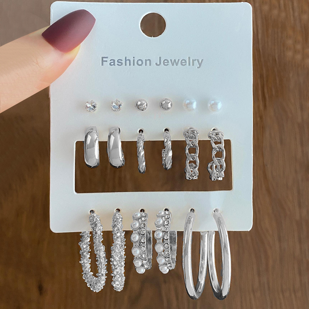 A new cross-border personalized metal twisted chain spiral ear ring and pearl earring women's set of 9 pieces full figure