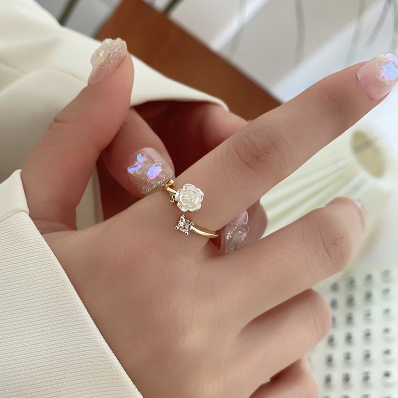 Camellia open ring, sweet and cool female style, niche design, fashionable and individual, light luxury, high-end zircon index finger ring full figure