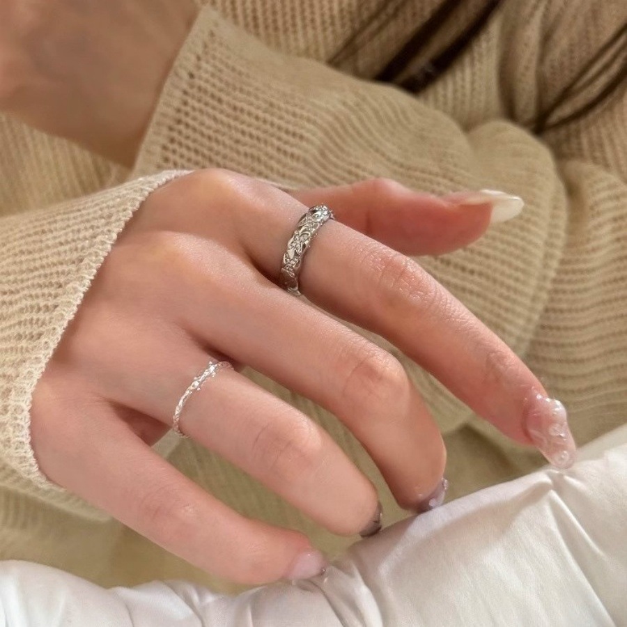 This is a niche design with a diamond-patterned bezel zircon ring, exuding a sense of luxury and sophistication for women. It's a versatile and elegant open-ring trend details Picture