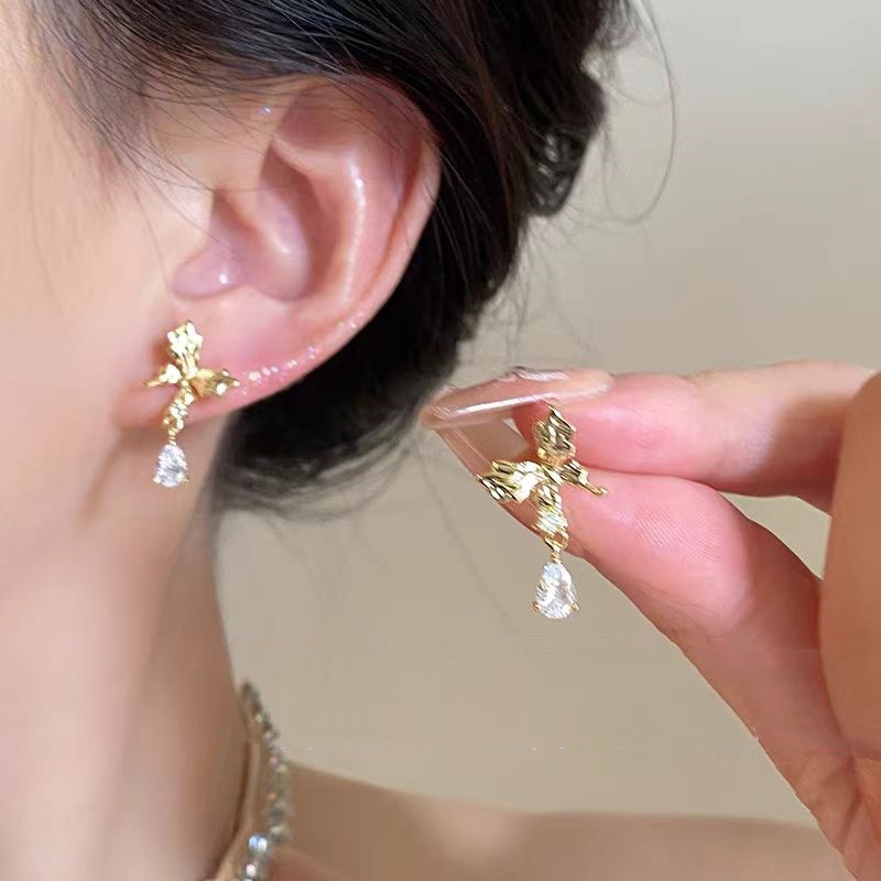 Water drop diamond bow stud earrings for women, a light luxury and high-end look, simple and versatile ear clips, a new 2025 unique and niche ear accessory full figure