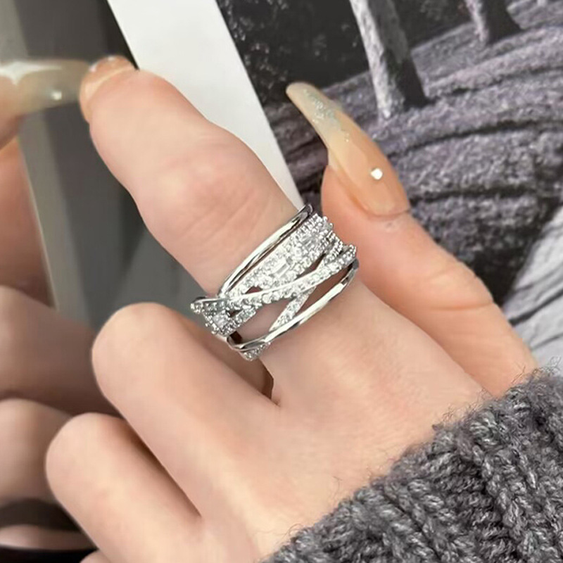 The light luxury and high-end line encirclement zircon open ring is a simple, fashionable, individual and niche design for women details Picture