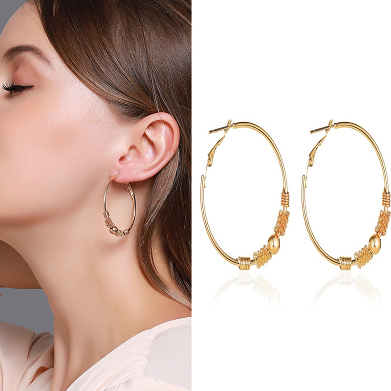 Korean-style design wrapped beaded earrings, Hong Kong-style simple geometric hollowed-out circle earrings and ear buckle accessories full figure