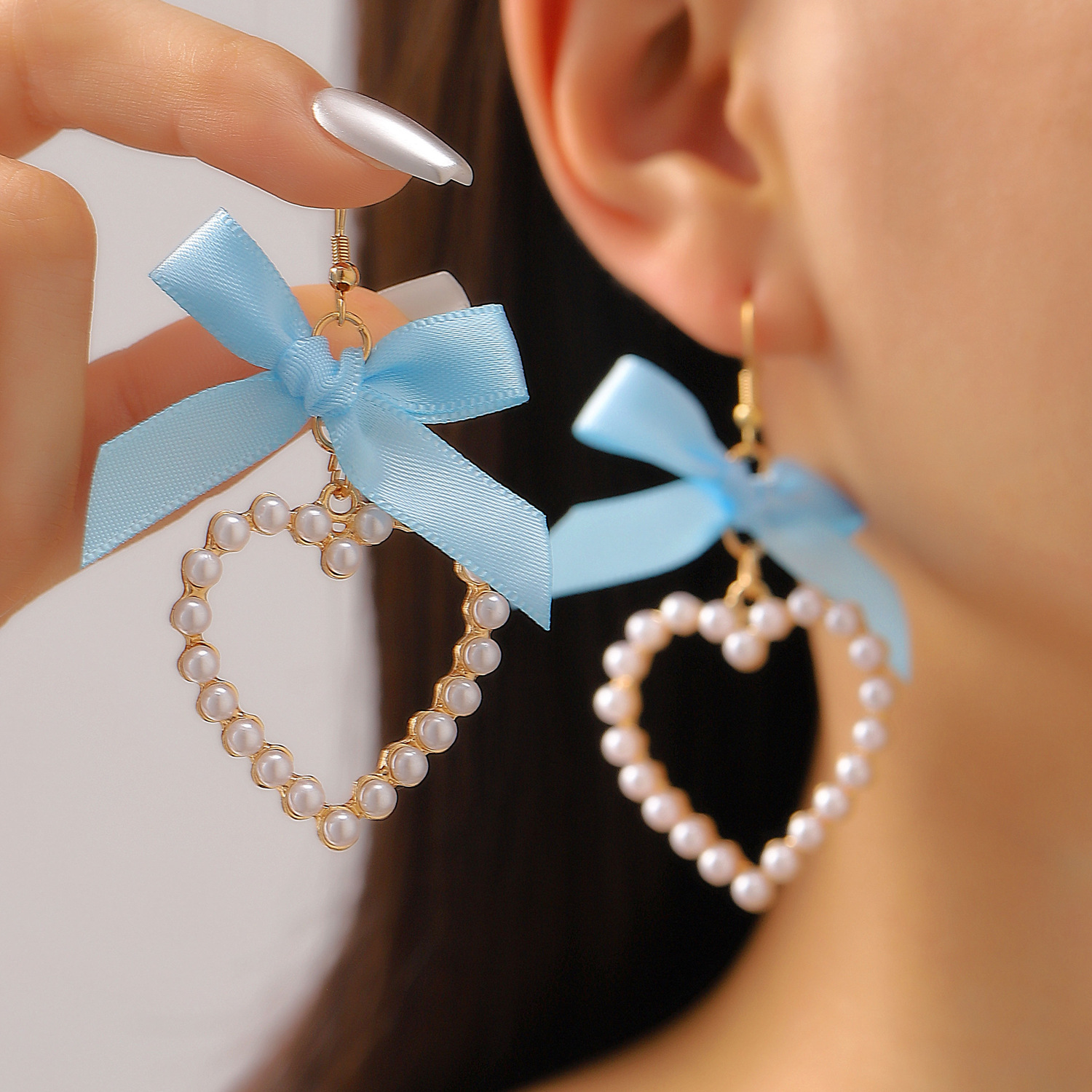 Cross-border sweet and cute bow ribbon imitation pearl heart earrings, women's fashionable and elegant, niche and high-end earrings Specification drawing