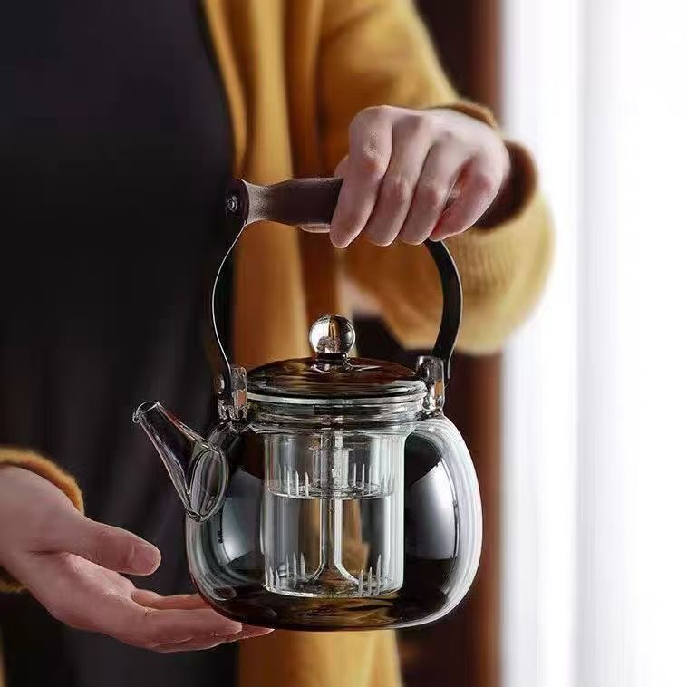 This is a large-capacity household steaming and boiling teapot with a handle. It is made of smoke grey wood and has a starry sky handle. It is a glass boiling teapot Specification drawing