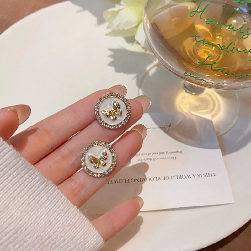 High-end diamond-encruted butterfly earrings for women, light luxury, niche and simple round stud earrings, wholesale of earrings from Dongdaemun, South Korea full figure