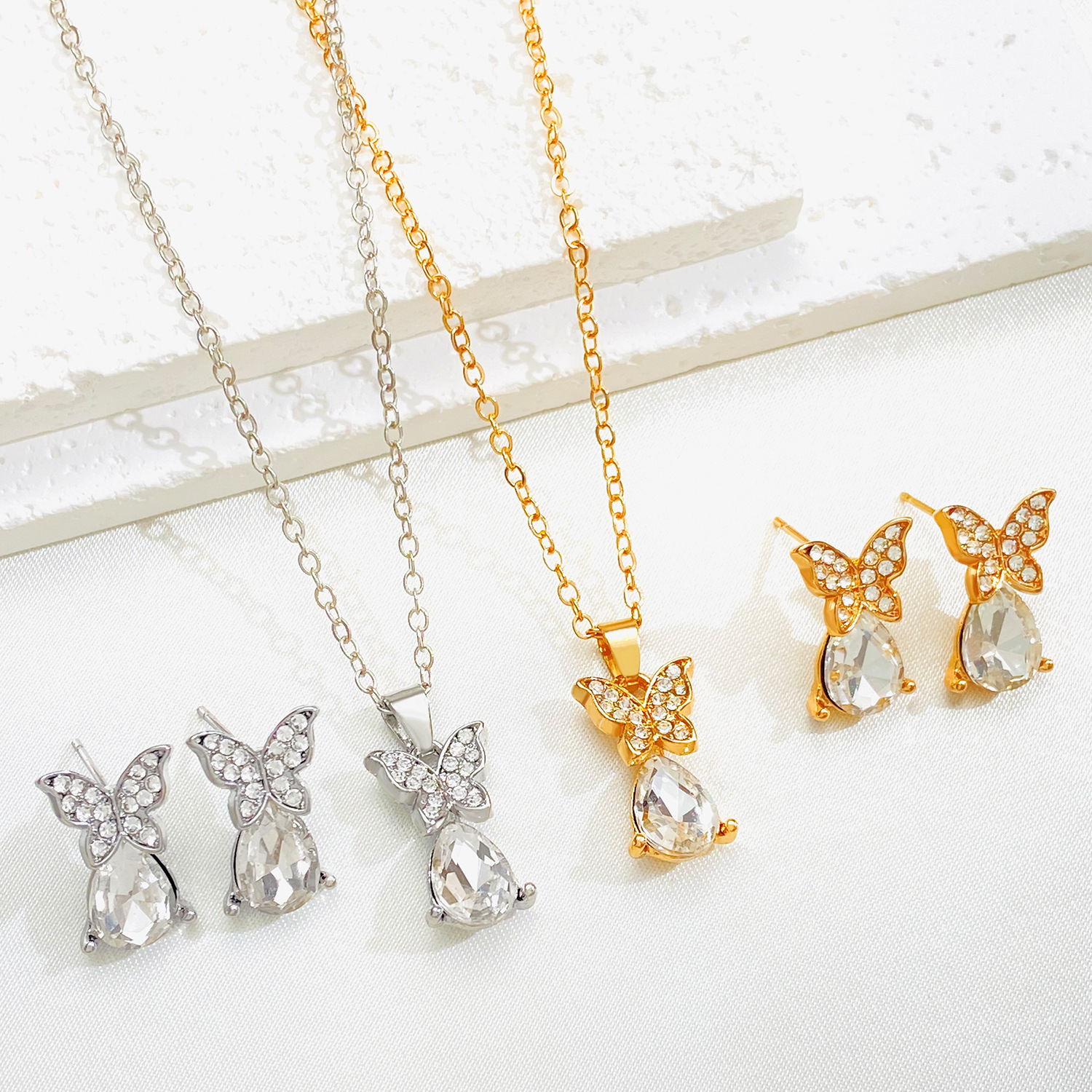 European and American cross-border diamond-encrusted butterfly water drop jewelry set, women's InS-style creative butterfly necklace and earring set details Picture