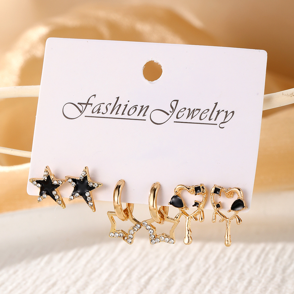 High-end black butterfly water diamond star earrings, retro tassel cross stud earrings for girls, fashionable three pieces of earrings for women Application Scenario