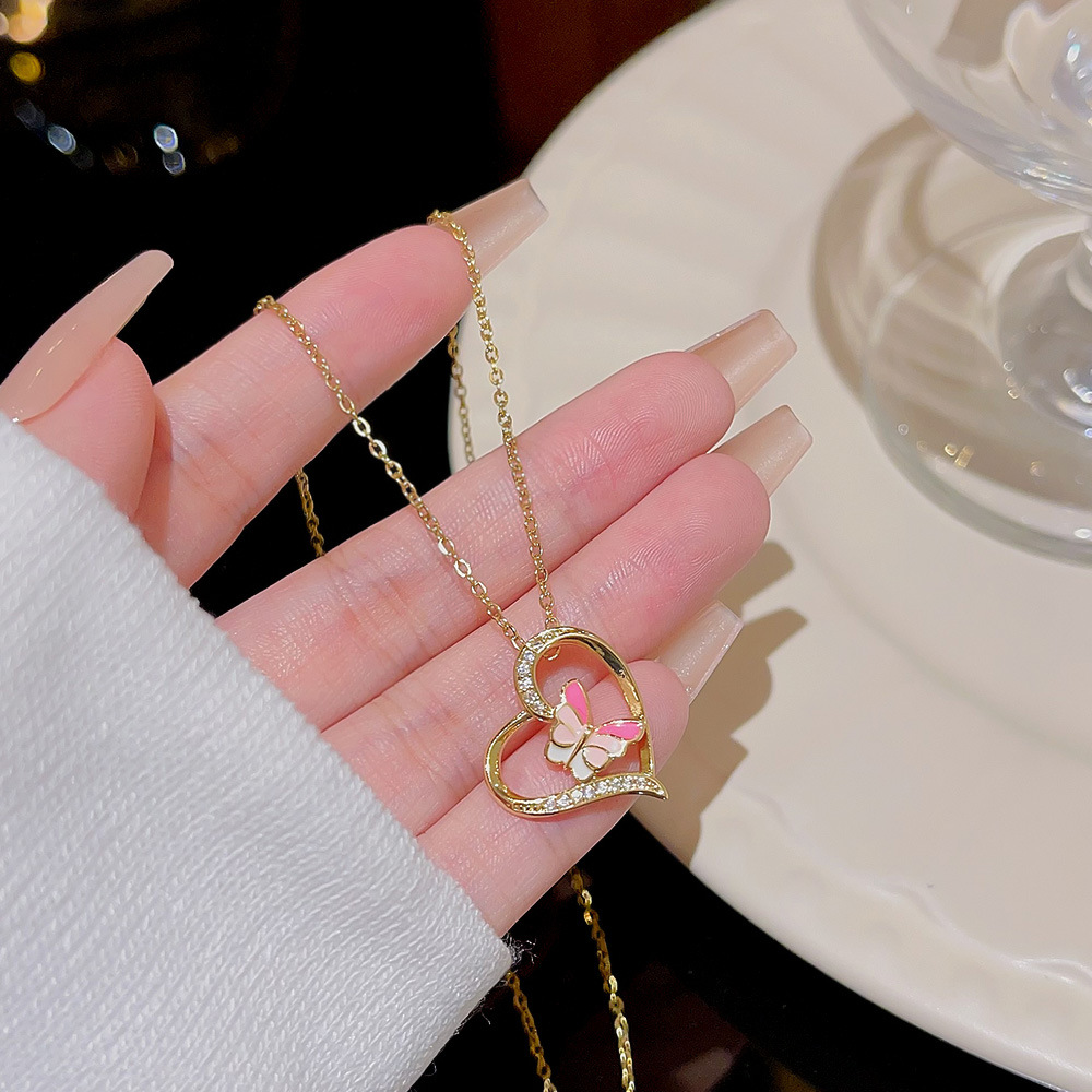 Sweet and heart-shaped necklace, a niche design for women, colorful butterfly pendant, collarbone chain, new 2024 sweater chain accessory details Picture