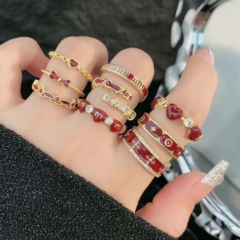 The sweet and cool enamel red drip glaze white open ring is a light luxury, exquisite and versatile, niche and high-end ring for women details Picture