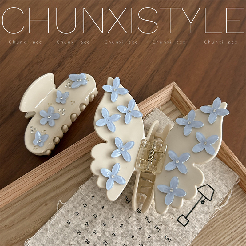Korean-style butterfly acetate grabber women's flower hair clip with a high-end feel 2024 new back head updo shark clip hair accessory Application Scenario