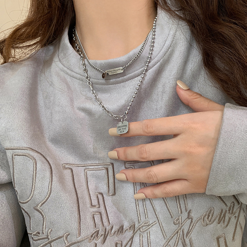 Double-layer round pendant necklace for women's autumn and winter hip-hop cold style decorative accessories, titanium steel non-fading long hoodie chain Application Scenario