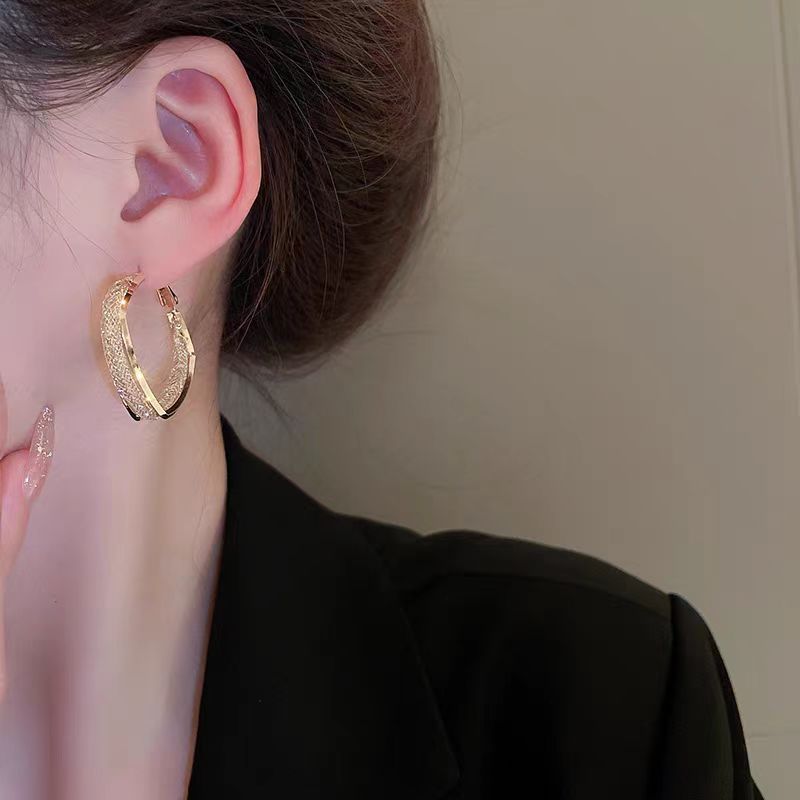Golden earrings, a light luxury and niche design for women, double-layer high-end zircon stud earrings, a cool and elegant style, exaggerated earrings details Picture