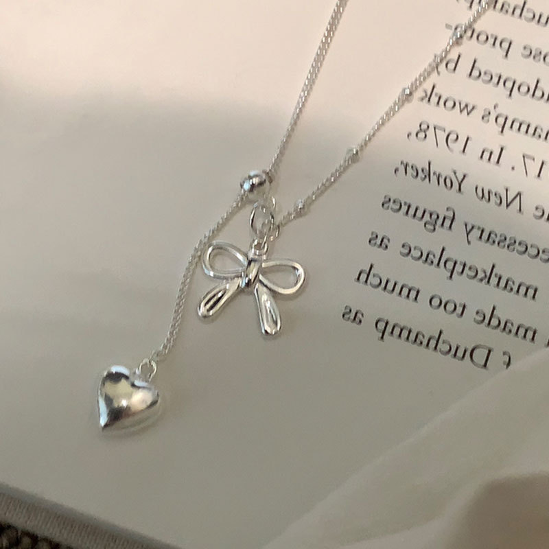 A design sense bow heart pull-out adjustable necklace for women, simple and elegant, light luxury, versatile neckchain, collarbone chain details Picture