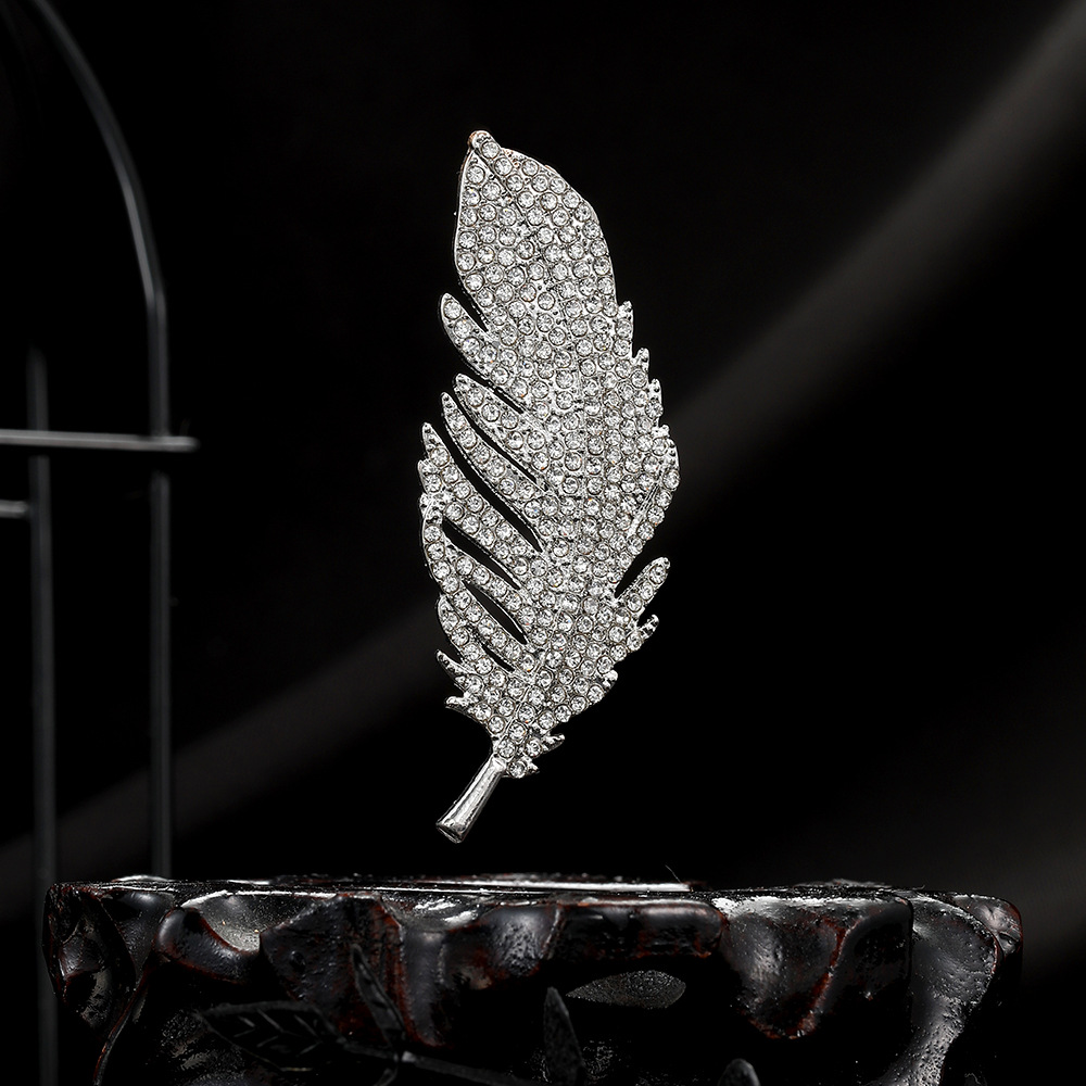 Cross-border European and American style diamond-encrusted exquisite feather brooch, light luxury and high-end feel, ins style fashionable sweater and suit pin full figure