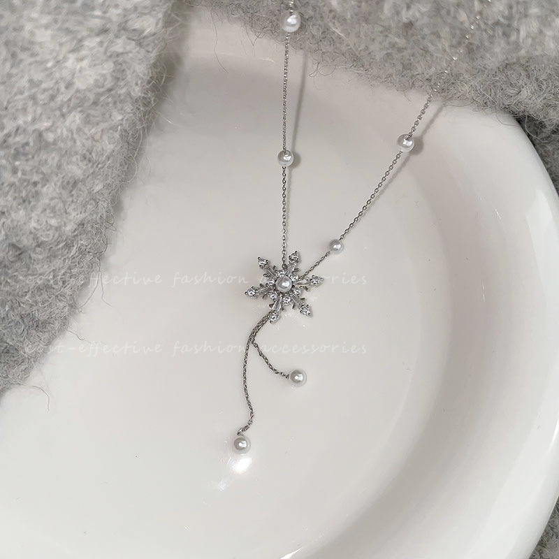 Autumn and winter snowflake tassel pearl necklace for women 2023 new style sweater chain, light luxury and niche collarbone chain details Picture