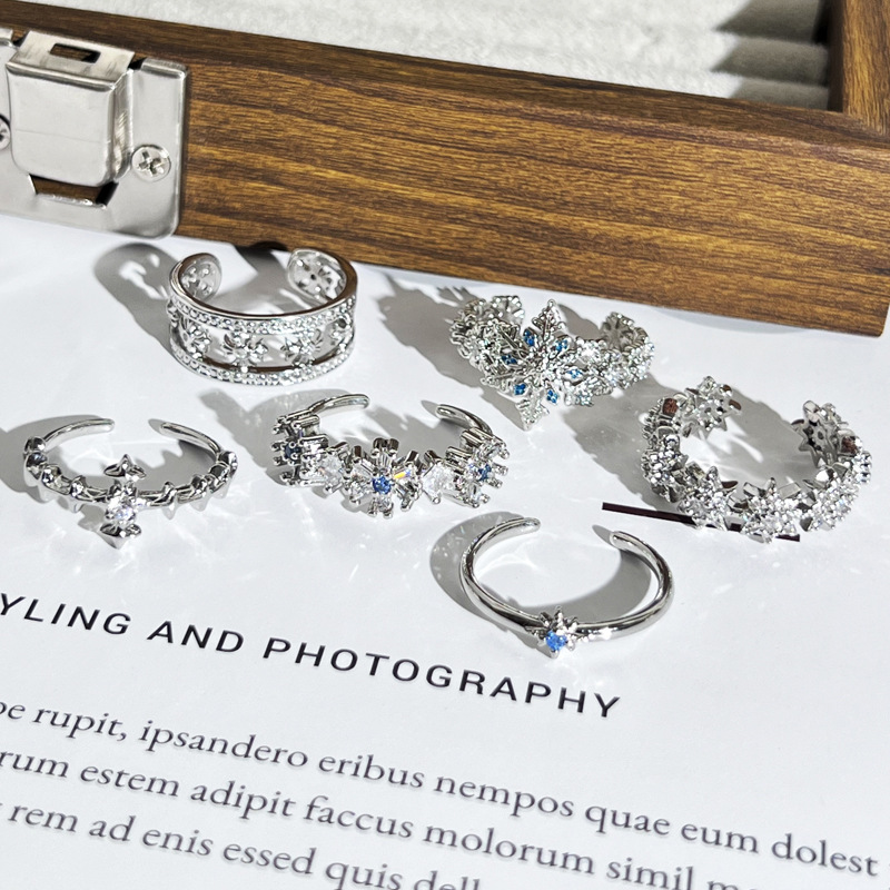 French-style simple and individual starlight snowflake fashionable and elegant open ring, a cold and aloof design for women, a light luxury ring Specification drawing