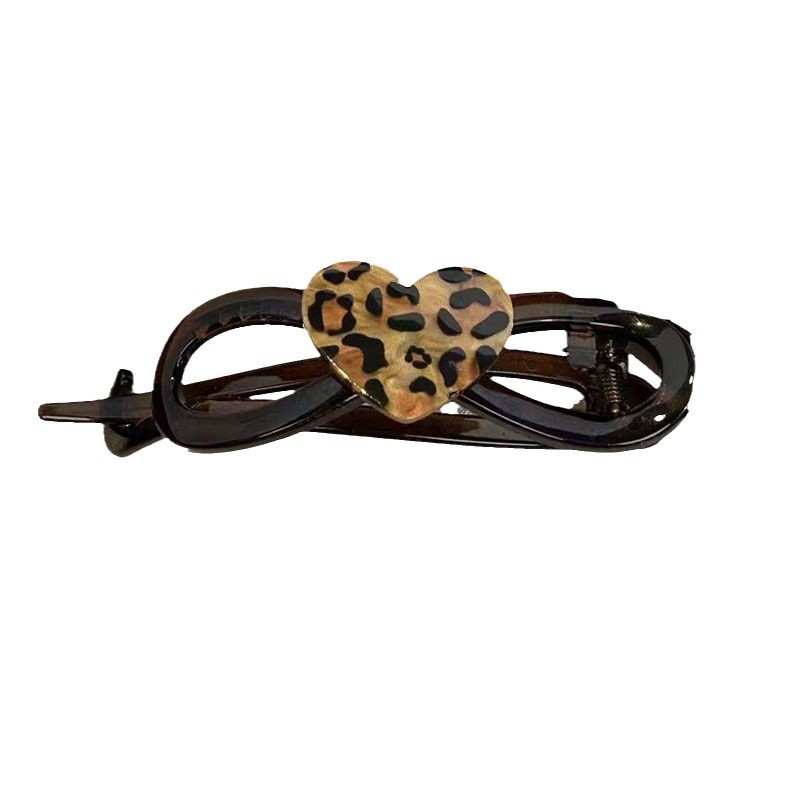 Cute and adorable leopard-print cat twist clip with a high-end look, a one-line scratch-off on the back of the head for women's updo headwear Item Picture