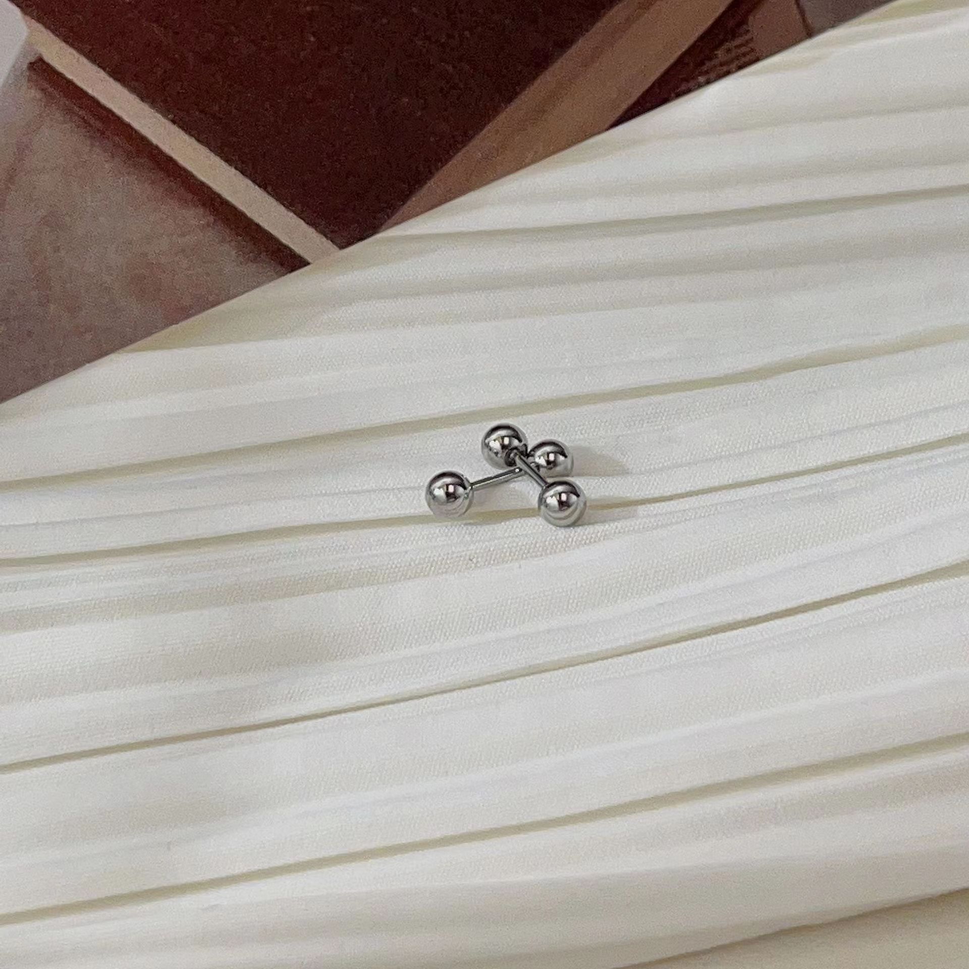 Titanium steel screw snap ear bone nails are small, versatile, and personalized. They are simple and cold style earrings that are popular online accessories Application Scenario