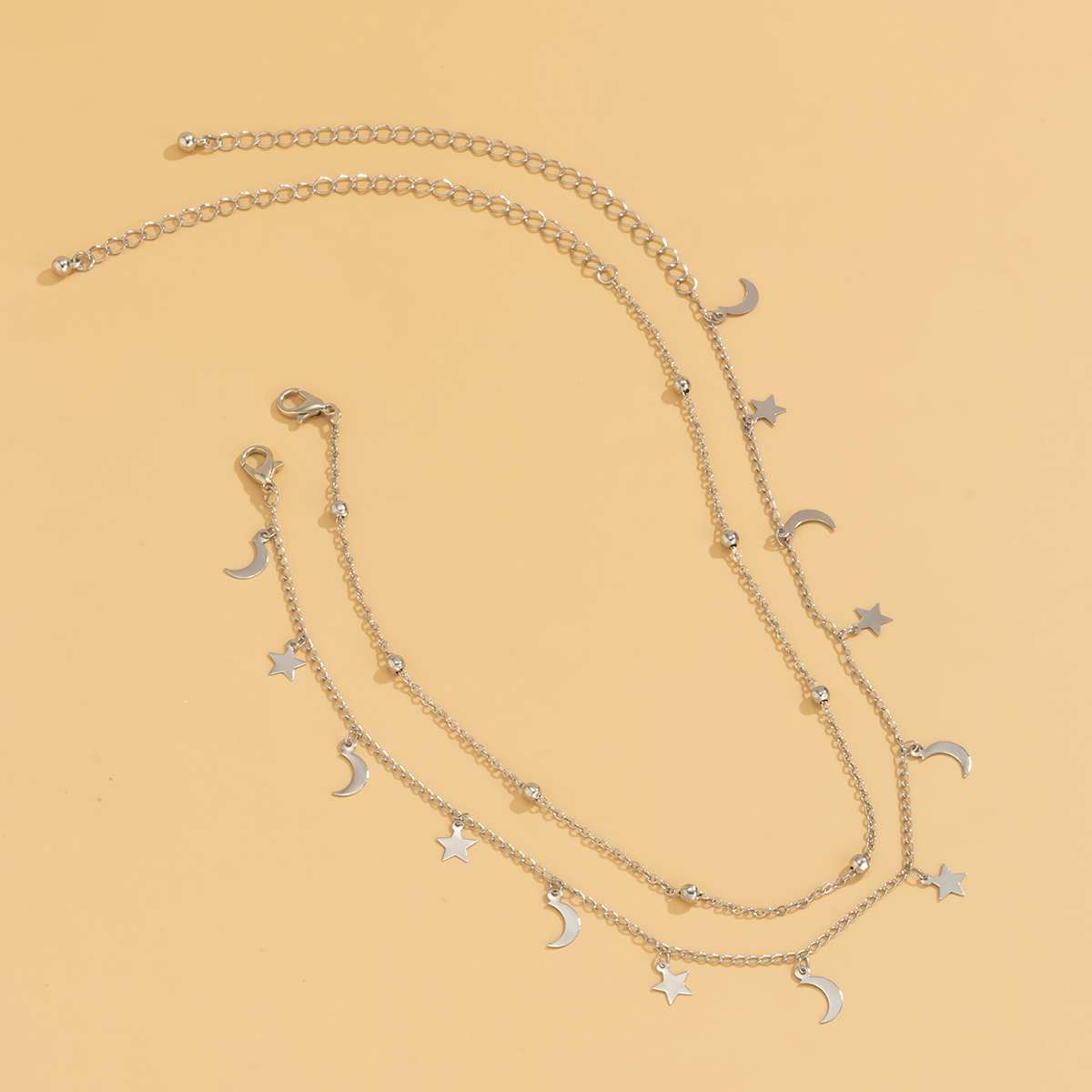 Fashionable star and moon tassel fine chain necklace, simple and retro metal copper piece necklace, European and American cross-border jewelry details Picture