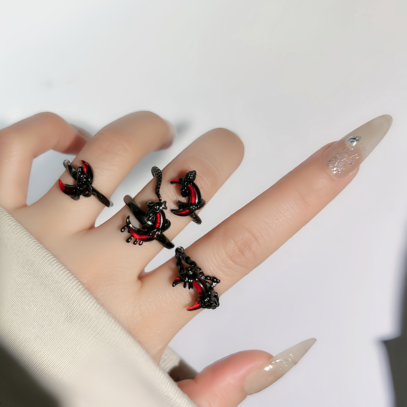 Unique red crescent-shaped lava opening ring for women, European and American dark punk fashion, thorny pleated ring trend details Picture