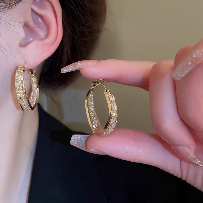 Golden earrings, a light luxury and niche design for women, double-layer high-end zircon stud earrings, a cool and elegant style, exaggerated earrings full figure
