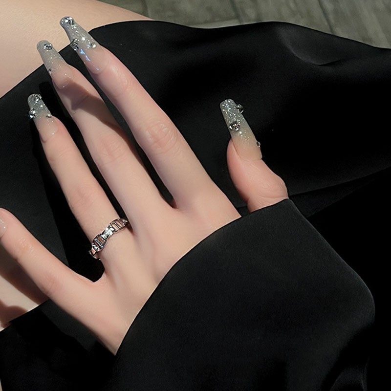 This is a versatile and stylish ring for women. It is a unique and individualistic index finger ring with an adjustable opening. It features a cold and luxurious style with a slight inlay Item Picture