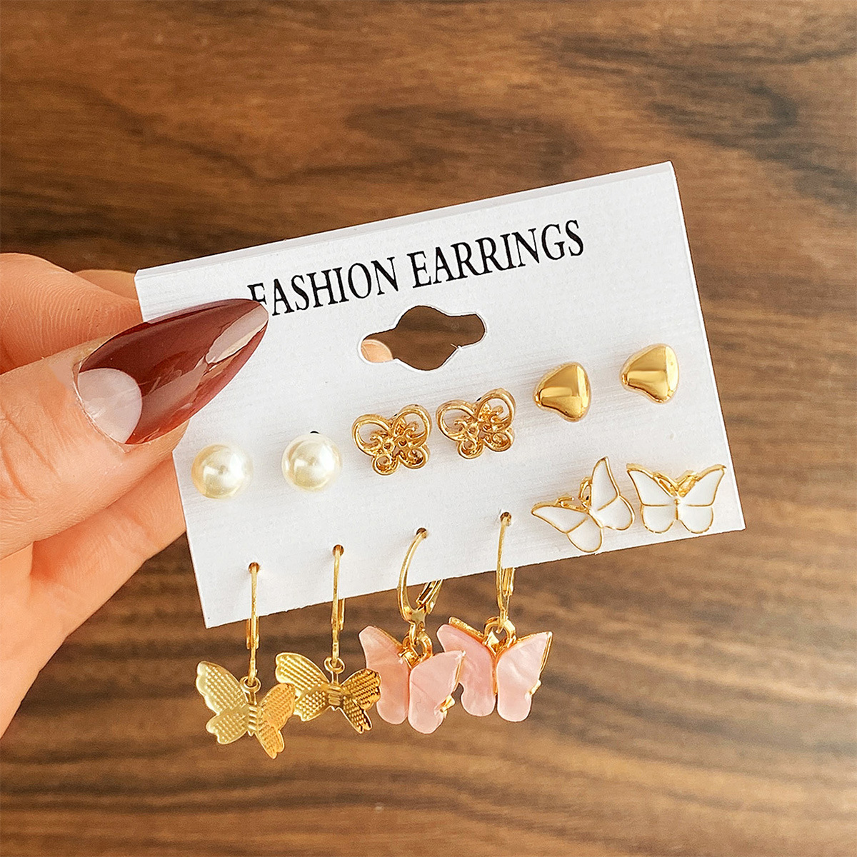 European and American cross-border creative and simple pearl heart-shaped ear rings, butterfly ear clips, retro card earrings 6-piece set batch full figure