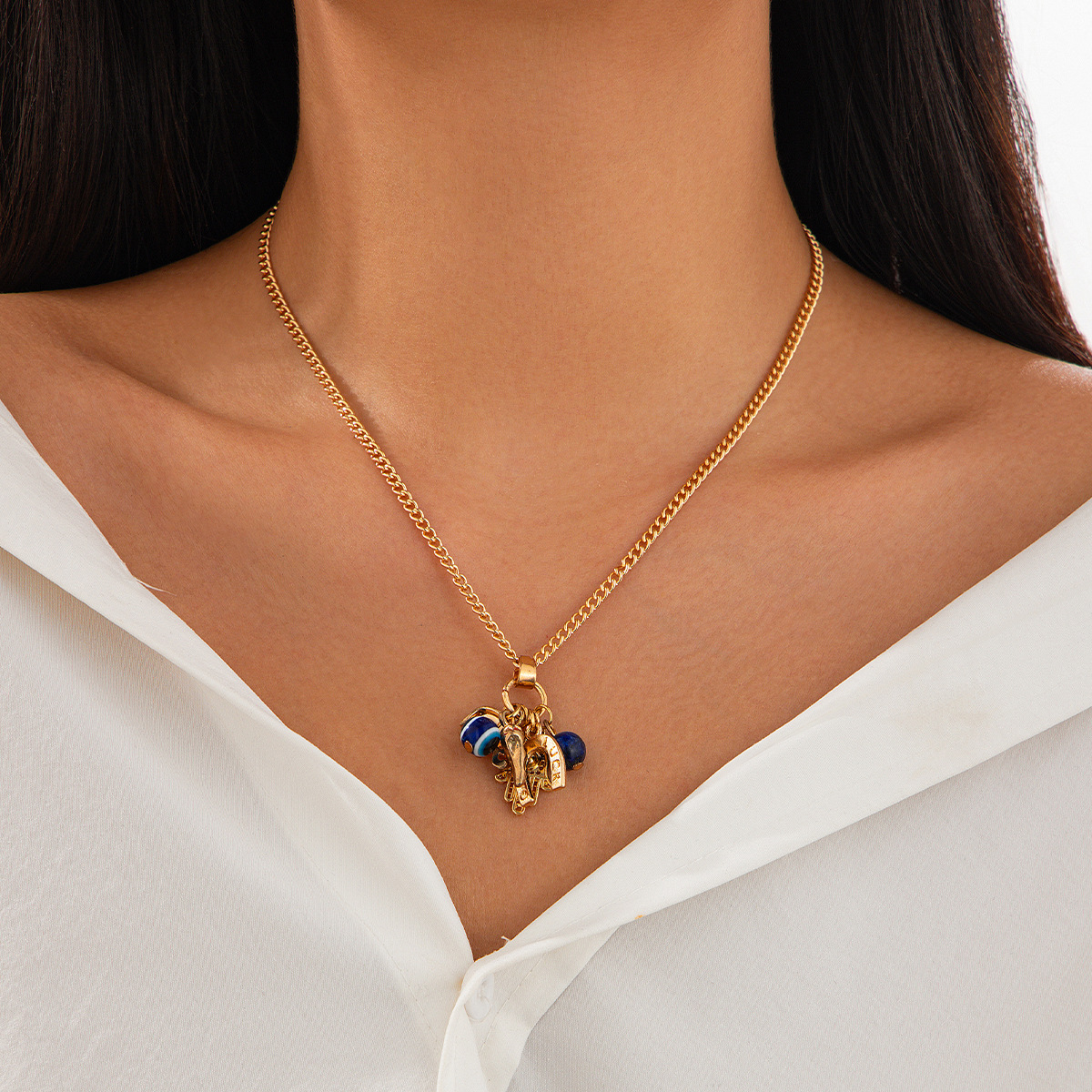 European and American cross-border jewelry, InS-style Buddha's hand and eye alloy pendant necklace, conch acrylic rice beads collarbone chain full figure