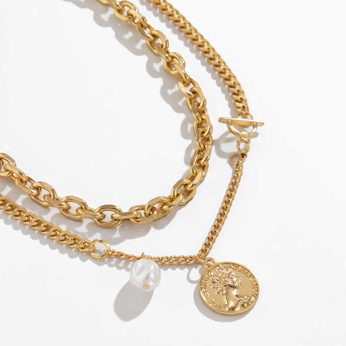 European and American cross-border jewelry: simple geometric cross-chain portrait pendant necklace, retro imitation pearl hollowed-out necklace Application Scenario