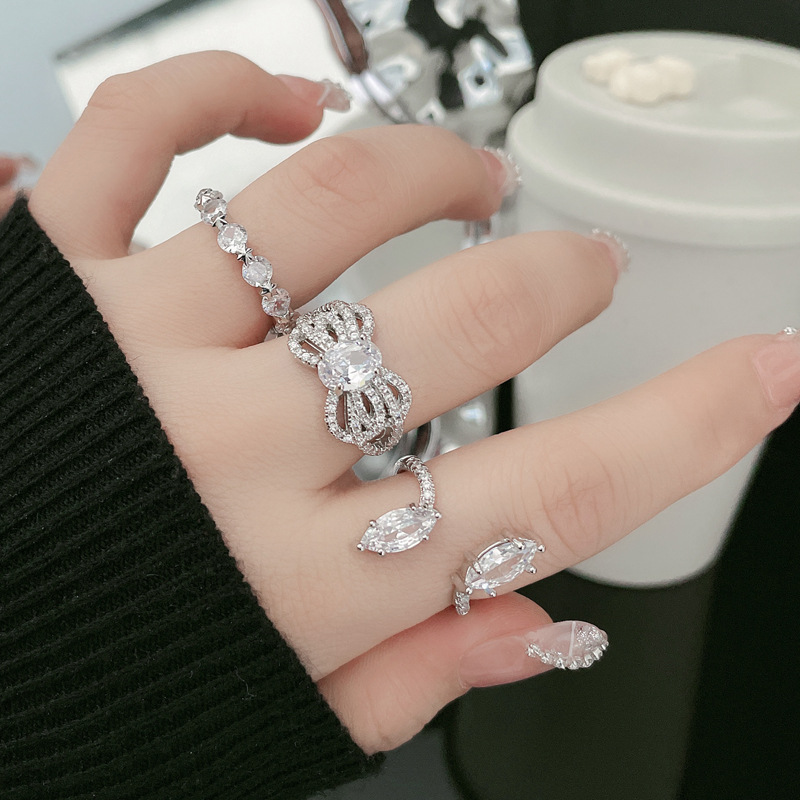 A light luxury and high-end full-diamond zircon bow open ring for women's ins, with a cold style, individual temperament and fashionable charm Application Scenario