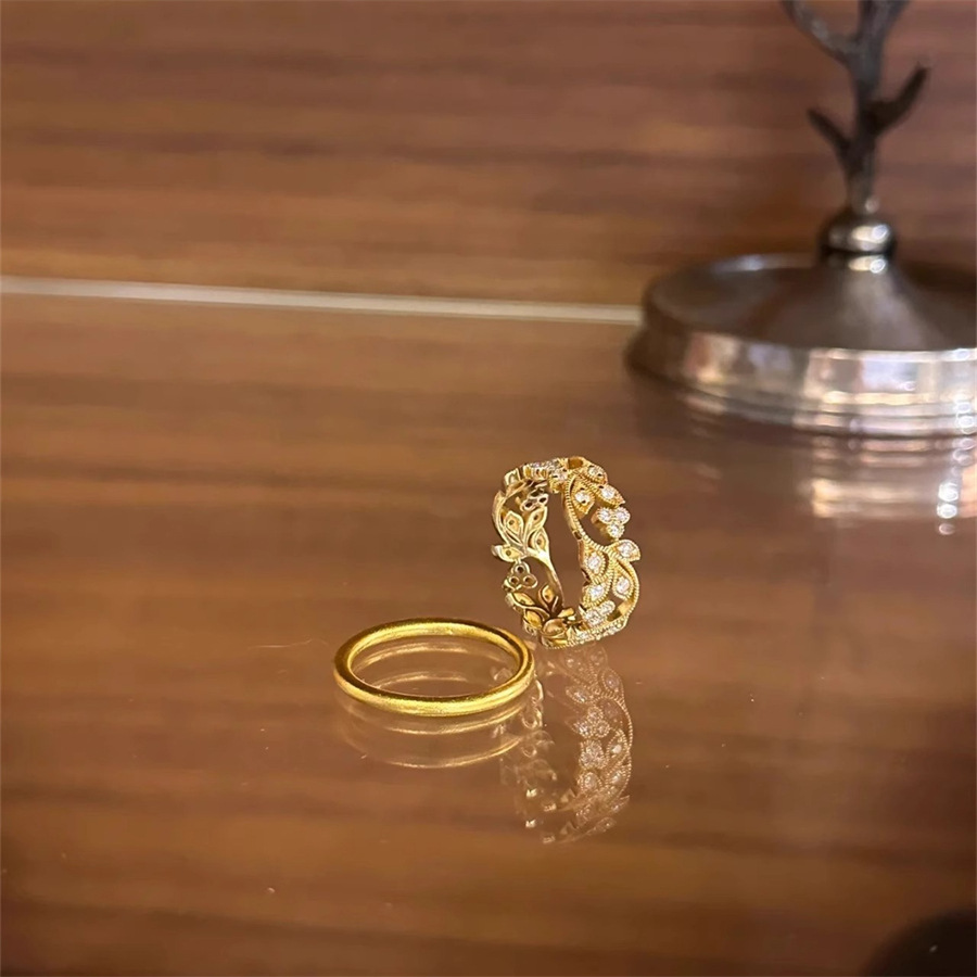 French light luxury retro carved lace weave dot diamond leaf ring for women, a niche opening adjustable zircon ring Item Picture