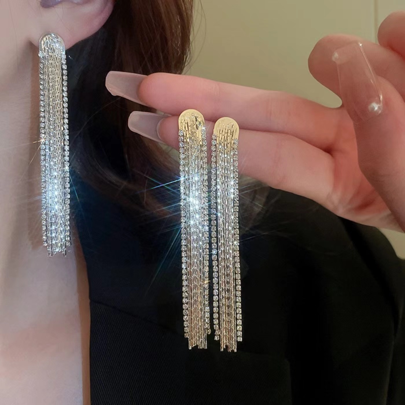 Light luxury high-end metallic long tassel stud earrings for women, trendy and stylish in Instagram, versatile and fashionable, with a unique design sense full figure