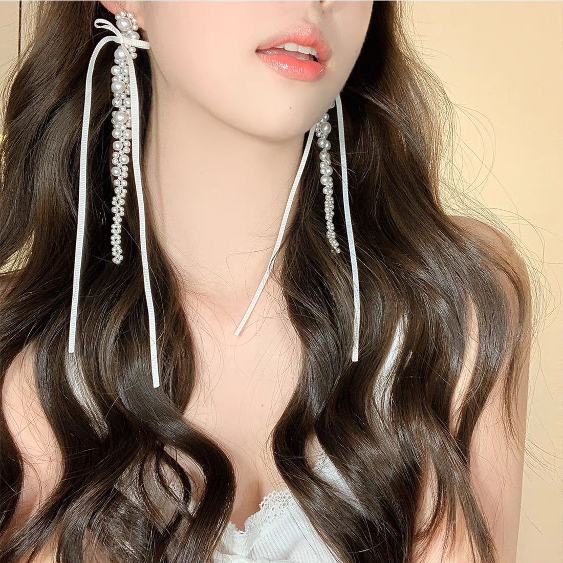 French laid-back white ribbon long tassel earrings, ballet face-enhancing small earrings, spring new style, unique and exaggerated details Picture