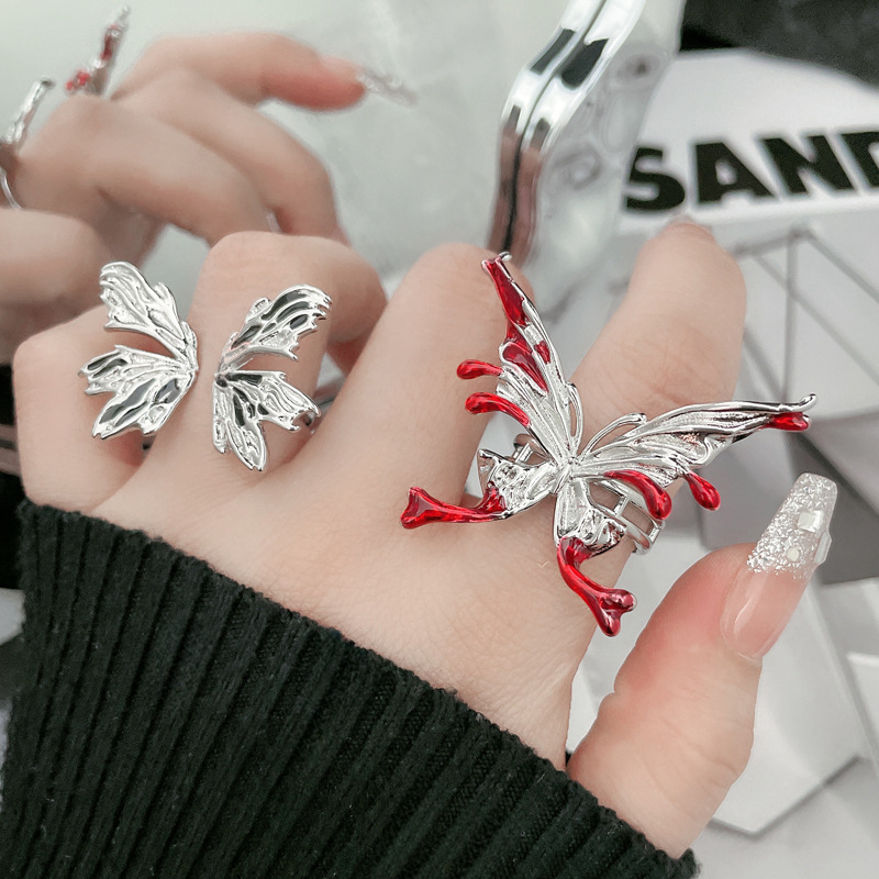 The new liquid irregular butterfly ring is a unique, sweet, cool, exaggerated and spicy girl's dancing personality adjustable index finger ring full figure