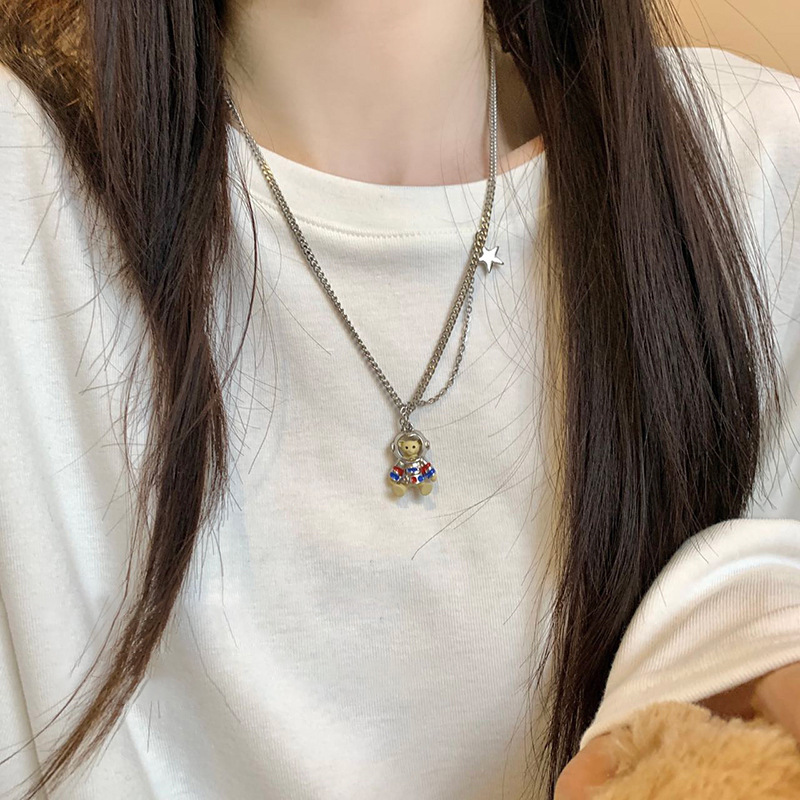 Silver astronaut bear hoodie necklace, women's light luxury and niche design, hip-hop style long sweater chain accessory full figure