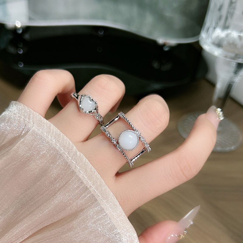The new simple and plain ring with a heart moonstone open ring is a versatile and fashionable, cold and unique ring trend for women full figure