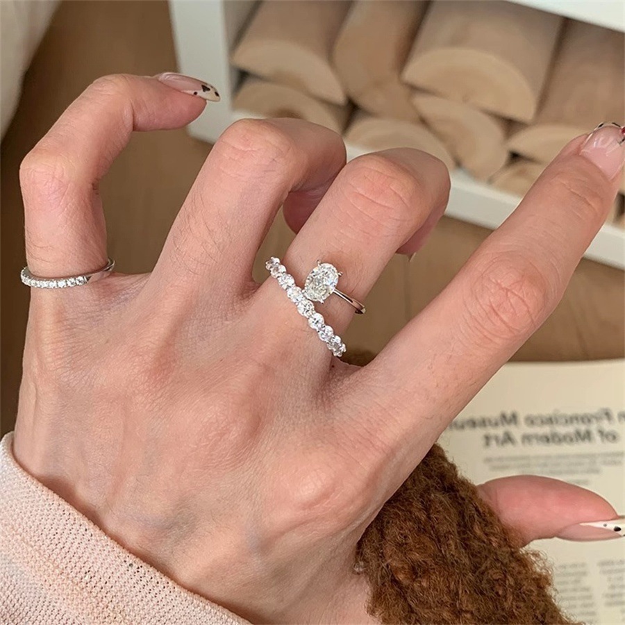 Exquisite super sparkling micro-inlaid pigeon egg zircon ring for women, s925 silver, light luxury, high-end and elegant, versatile row diamond ring Application Scenario