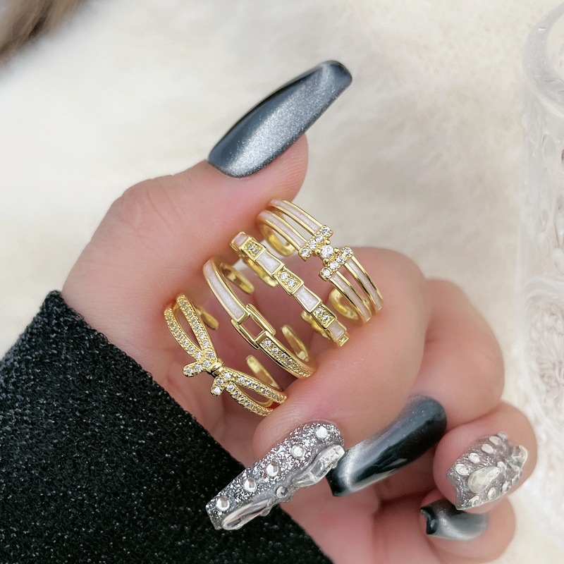 Versatile open ring, women's niche design bow letter index finger ring, light luxury, high-end, sweet and cool unique ring full figure