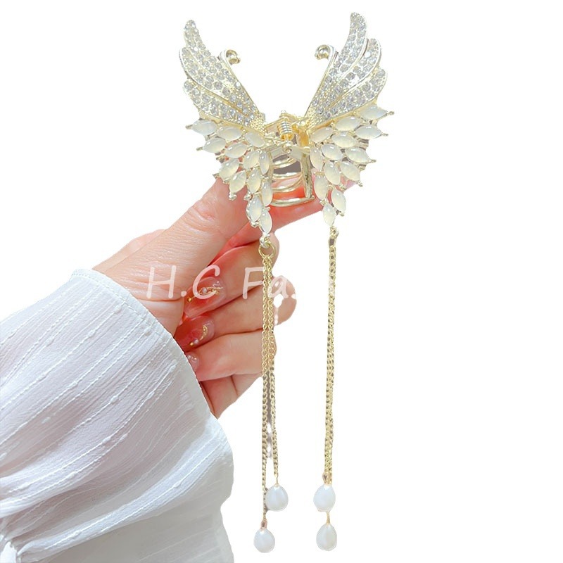 Elegant and refined butterfly tassel hair clip, women's Chinese-style semi-tied ponytail clip, back of the head hair tie clip, sweet hair accessory Item Picture