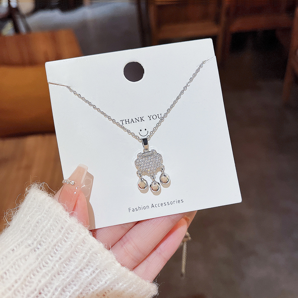 Ethnic-style ruyi peace Lock bell pendant necklace, a new niche women's collarbone chain, light luxury and simple necklace wholesale details Picture