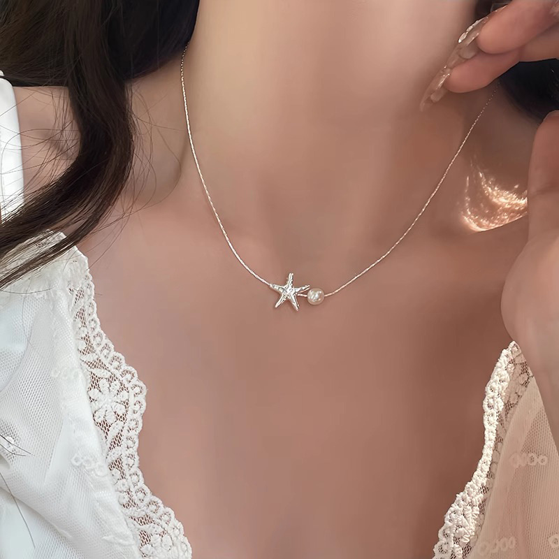 Summer beach silver starfish necklace for women, light luxury, niche and simple style, pearl collarbone, internet-famous necklace wholesale Application Scenario