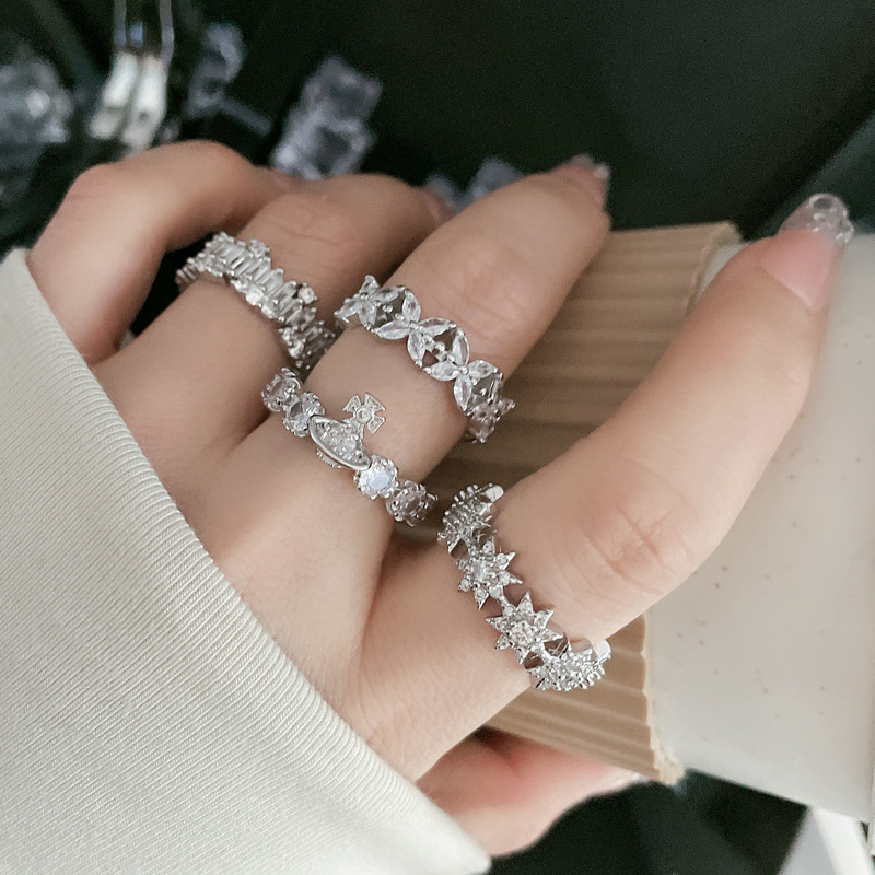 A light luxury full-diamond fashion open-mouth ring with an Instagram cold style, individual temperament, niche and high-end feel, a Saturn ring index finger ring Application Scenario