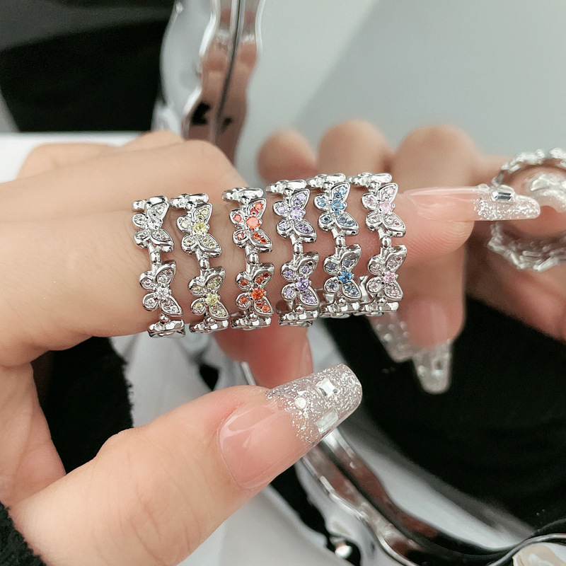 A high-end, super sparkling zircon butterfly ring for women on Instagram, with a cool, sweet and light luxury color diamond style. It's a popular adjustable ring Application Scenario