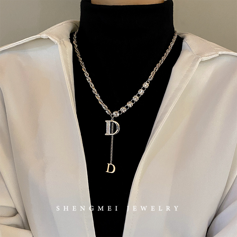 Light luxury and niche design letter necklace, female hip-hop and hot girl collarbone chain-like zircon sweater chain wholesale on Instagram Application Scenario