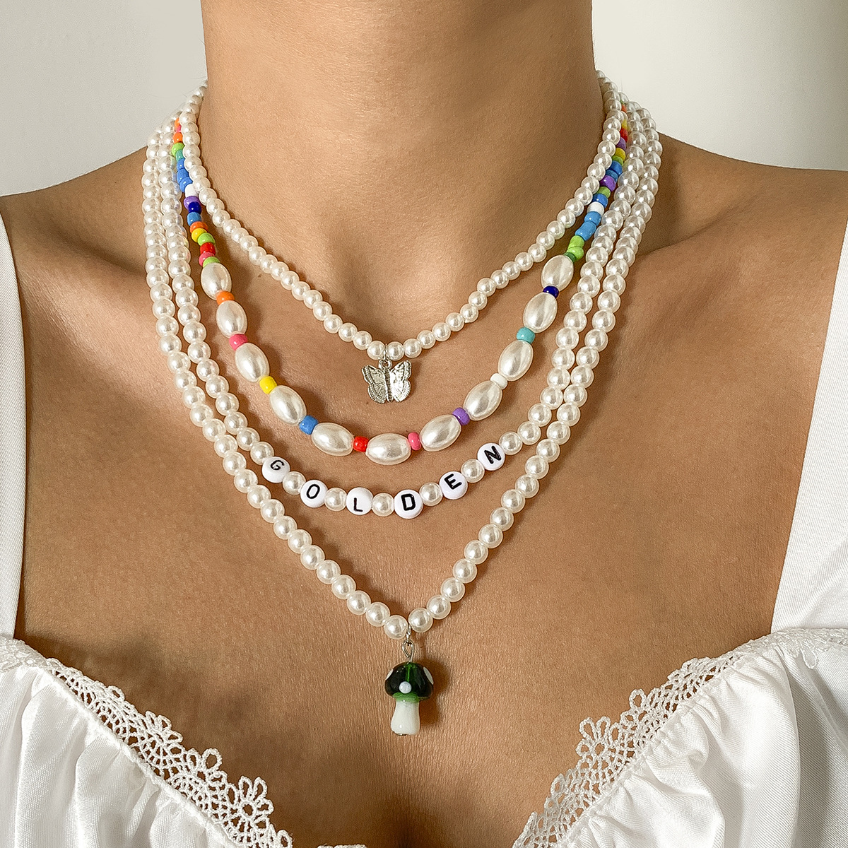European and American sweet and cool multi-element acrylic letter round bead chain necklace, color-blocking rice beads, mushroom beaded, butterfly necklace full figure