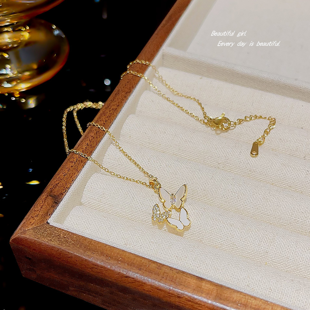 The popular titanium steel necklace for women, with a light luxury style and a high-end feel, is a niche and versatile piece. Zircon pendant and sweet butterfly collarbone chain full figure
